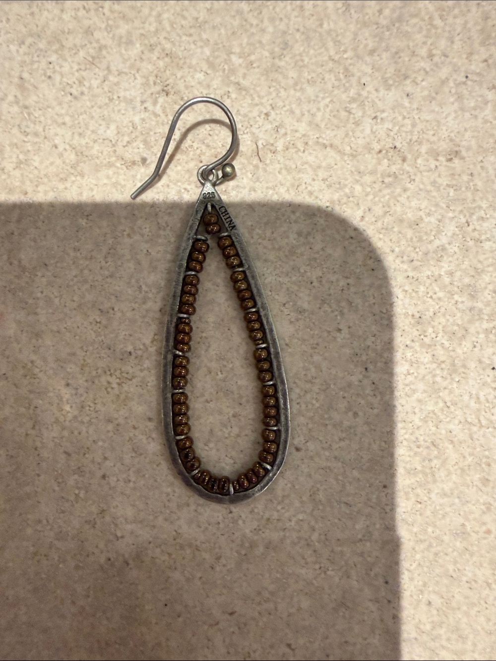 Silpada single sterling silver + bronze bead earring